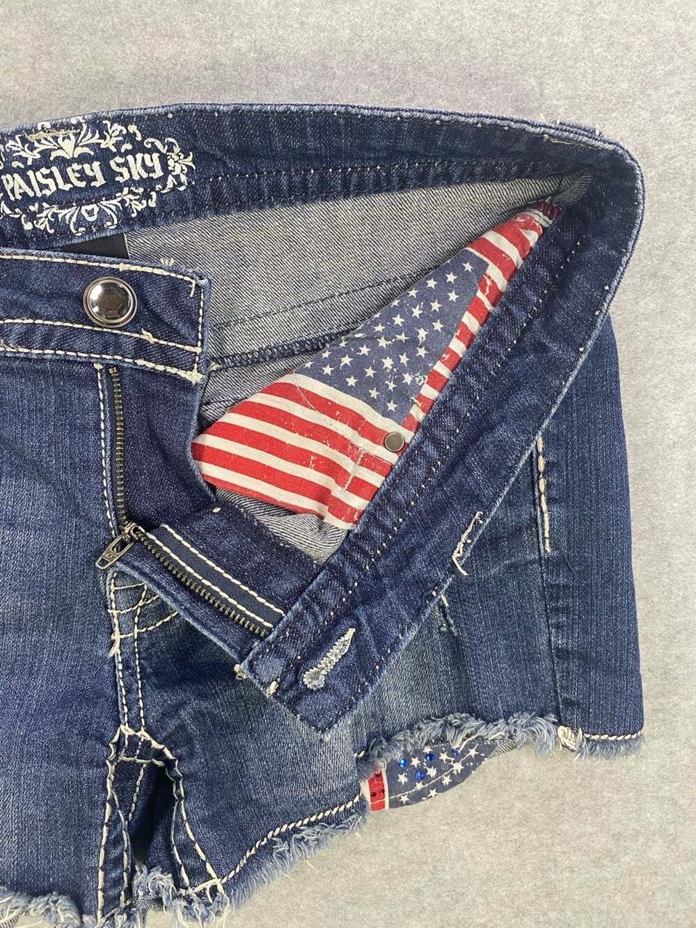 Paisley Sky Denim Shorts with American Flag Patch and Rhinestone Embellishments - Picture 9 of 9